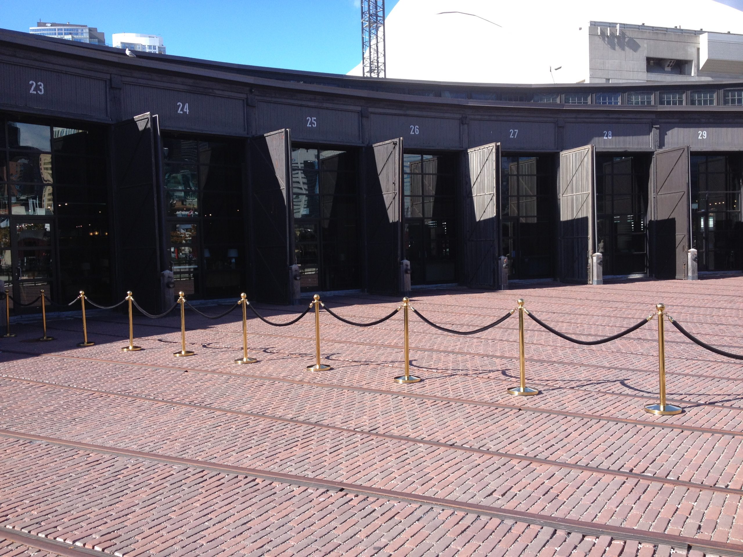 BRASS STANCHIONS WITH BLACK VELVET ROPE